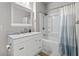 Modern bathroom features a vanity with white cabinets and a marble countertop, complemented by a shower-tub combo at 130 River Landing Dr # 9104, Charleston, SC 29492