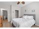 Cozy bedroom featuring a neutral color palette, a ceiling fan, and a closet for ample storage at 130 River Landing Dr # 9104, Charleston, SC 29492