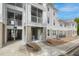 Attractive building exterior with private patios and ample parking, showcasing modern design and accessibility at 130 River Landing Dr # 9104, Charleston, SC 29492