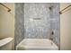 Modern bathroom featuring stylish shower, modern faucet, and tile work at 1300 Park West Blvd # 519, Mount Pleasant, SC 29466