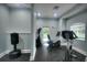 Bright gym with workout equipment and a door that brings in natural light at 1300 Park West Blvd # 519, Mount Pleasant, SC 29466