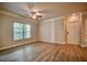 Well-lit living room with plank flooring and a large window providing natural light at 1300 Park West Blvd # 519, Mount Pleasant, SC 29466