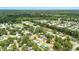 Wide aerial shot capturing a community with tree-lined streets, diverse homes, and a sense of suburban tranquility at 1304 Pinyon Pine Dr, Ladson, SC 29456