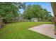 Well-maintained backyard with a storage shed and a concrete patio area at 1304 Pinyon Pine Dr, Ladson, SC 29456