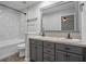 Bathroom featuring double sink vanity, and tiled shower and tub at 1304 Pinyon Pine Dr, Ladson, SC 29456