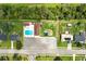 Aerial view featuring the community pool, clubhouse, parking lot, and playground, creating a Gathering-friendly environment at 1304 Pinyon Pine Dr, Ladson, SC 29456