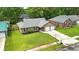 Charming brick home featuring a well-manicured lawn and a two-car garage at 1304 Pinyon Pine Dr, Ladson, SC 29456