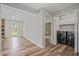 Spacious laundry area with modern appliances, adjacent to additional living spaces at 1304 Pinyon Pine Dr, Ladson, SC 29456