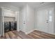Laundry room with modern washer and dryer, plus extra storage cabinets, for easy chores at 1304 Pinyon Pine Dr, Ladson, SC 29456