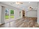 Bright and airy living room opens to fenced-in yard with sliding glass doors at 1304 Pinyon Pine Dr, Ladson, SC 29456