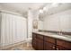 Bathroom featuring double vanity with granite countertop and shower with curtain at 1309 Belgian Draft Dr, Mount Pleasant, SC 29466