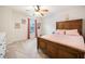 Bedroom featuring a ceiling fan and large windows with pink curtains at 1309 Belgian Draft Dr, Mount Pleasant, SC 29466