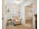 Bedroom features neutral carpeting, an accent chair, a window, and a closet in the background at 1309 Belgian Draft Dr, Mount Pleasant, SC 29466