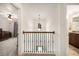 Upstairs hallway with a view to both a bedroom and a bathroom at 1309 Belgian Draft Dr, Mount Pleasant, SC 29466