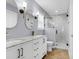 Stylish bathroom with double vanity, marble countertops, and a glass-enclosed shower at 1328 Lark Ln, Hanahan, SC 29410