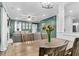 An open-concept dining and living space offers versatile living at 1328 Lark Ln, Hanahan, SC 29410