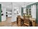 The dining room blends seamlessly to the kitchen with an abundance of natural light at 1328 Lark Ln, Hanahan, SC 29410