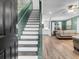 Inviting entryway showcases a staircase and seamlessly connects to the living and dining spaces at 1328 Lark Ln, Hanahan, SC 29410
