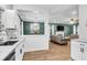 Open-concept kitchen with a view into the living area, perfect for entertaining guests at 1328 Lark Ln, Hanahan, SC 29410