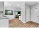 Open kitchen view flows into living area, enhancing spaciousness with natural lighting at 1328 Lark Ln, Hanahan, SC 29410