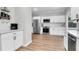 Bright, modern kitchen equipped with stainless steel appliances and plenty of counter space at 1328 Lark Ln, Hanahan, SC 29410