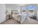Well-lit bedroom with carpet, soft natural light, and a comfortable bed with decorative pillows at 138 Brown Swiss Cir, Summerville, SC 29483