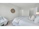 Cozy bedroom featuring neutral-toned walls, carpet, and a comfortable bed with a throw blanket and decorative pillows at 138 Brown Swiss Cir, Summerville, SC 29483