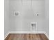 Empty walk-in closet with laminate floors and white wire shelving at 138 Brown Swiss Cir, Summerville, SC 29483