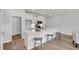 Bright kitchen with a central island and barstool seating at 138 Brown Swiss Cir, Summerville, SC 29483