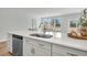 Modern kitchen island featuring a stainless steel dishwasher and sink at 138 Brown Swiss Cir, Summerville, SC 29483