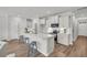 Bright kitchen with a central island and barstool seating at 138 Brown Swiss Cir, Summerville, SC 29483