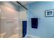 Clean bathroom with a shower and blue accents at 1384 Tibwin Rd, McClellanville, SC 29458