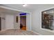 Bright room with painted walls, wood-look vinyl floors, a window, and a doorway at 1384 Tibwin Rd, McClellanville, SC 29458