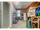 Spacious storage area with shelving and exposed brick, offering ample room for organizing and storing belongings at 1384 Tibwin Rd, McClellanville, SC 29458