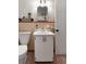 Bathroom with tiled flooring, tile backsplash, and modern vanity at 1417 Downing St, Charleston, SC 29407
