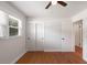Bedroom features hardwood floors, closet, an updated window, and a ceiling fan at 1417 Downing St, Charleston, SC 29407
