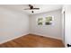 Bedroom features hardwood floors, white walls, updated window, and a ceiling fan at 1417 Downing St, Charleston, SC 29407