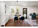 Bright dining room with modern decor, connecting seamlessly to the outdoors at 1417 Downing St, Charleston, SC 29407