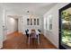 Dining room with wood floors and a stylish light fixture creating an inviting atmosphere at 1417 Downing St, Charleston, SC 29407