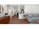 Modern living room flows to dining area featuring hardwood floors and stylish décor at 1417 Downing St, Charleston, SC 29407