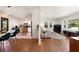 Open-concept living and dining area with hardwood floors, abundant natural light, and modern decor at 1417 Downing St, Charleston, SC 29407