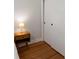 Bedroom featuring hardwood floors and a nightstand next to a closet with sliding doors at 1417 Downing St, Charleston, SC 29407