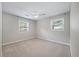 Bedroom with neutral carpet and paint, with natural lighting at 1520 Kirklees Abbey Dr, Charleston, SC 29407