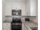 Modern kitchen featuring stainless steel appliances and granite countertops at 1520 Kirklees Abbey Dr, Charleston, SC 29407