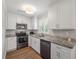 Updated kitchen with stainless steel appliances and granite countertops at 1520 Kirklees Abbey Dr, Charleston, SC 29407