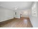 Bright living room featuring wood floors, neutral paint, a ceiling fan and updated fixtures at 1520 Kirklees Abbey Dr, Charleston, SC 29407