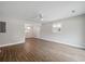Bright living room with hard wood floors, white walls, and lots of natural light at 1520 Kirklees Abbey Dr, Charleston, SC 29407