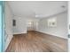 Bright living room featuring wood floors, neutral paint, a ceiling fan and updated fixtures at 1520 Kirklees Abbey Dr, Charleston, SC 29407