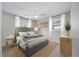 Beautifully staged bedroom with neutral palette, ceiling fan, and natural lighting at 1520 Kirklees Abbey Dr, Charleston, SC 29407