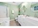 Bright bathroom with a double vanity sink, framed mirrors, a shower, and tiled floors at 170 Danzid Dr, Summerville, SC 29483